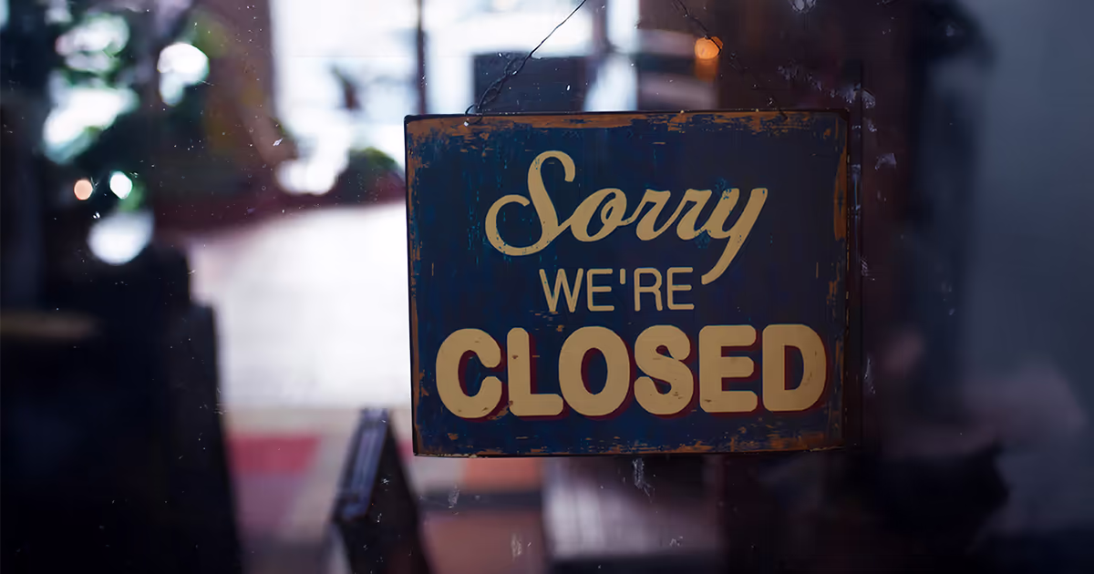 Empty storefront with no signage — representing a business with no online presence or website